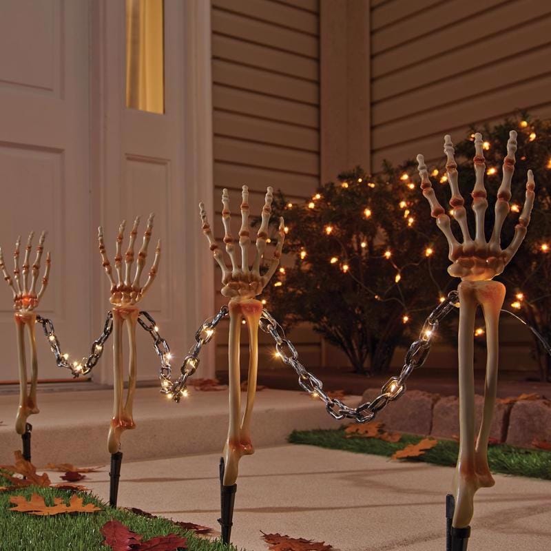 Celebrations 37199-71 Halloween Warm White 18 in. LED Prelit Chained Skeleton Arms Pathway Decor